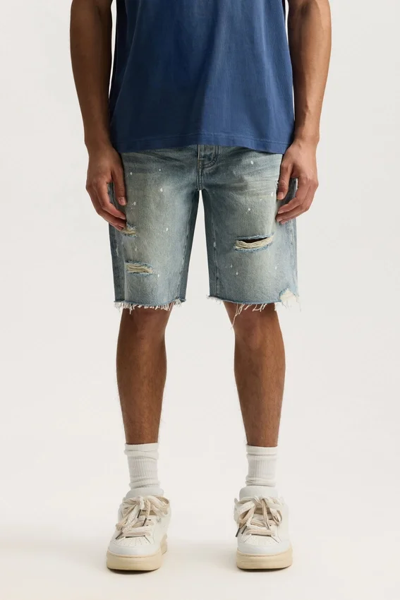 P059 Pantaloncini strappati effetto pittorico
