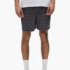 Pantaloncini con monogramma a cubi su tutto il capo