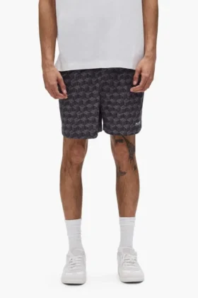Pantaloncini con monogramma a cubi su tutto il capo