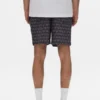 Pantaloncini con monogramma a cubi su tutto il capo
