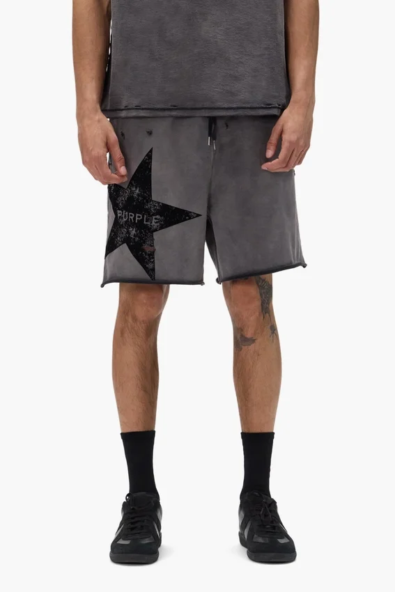 Pantaloncini con scritta a forma di stella