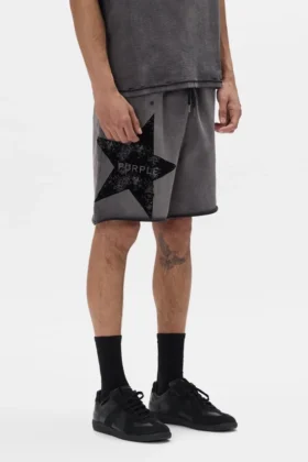 Pantaloncini con scritta a forma di stella