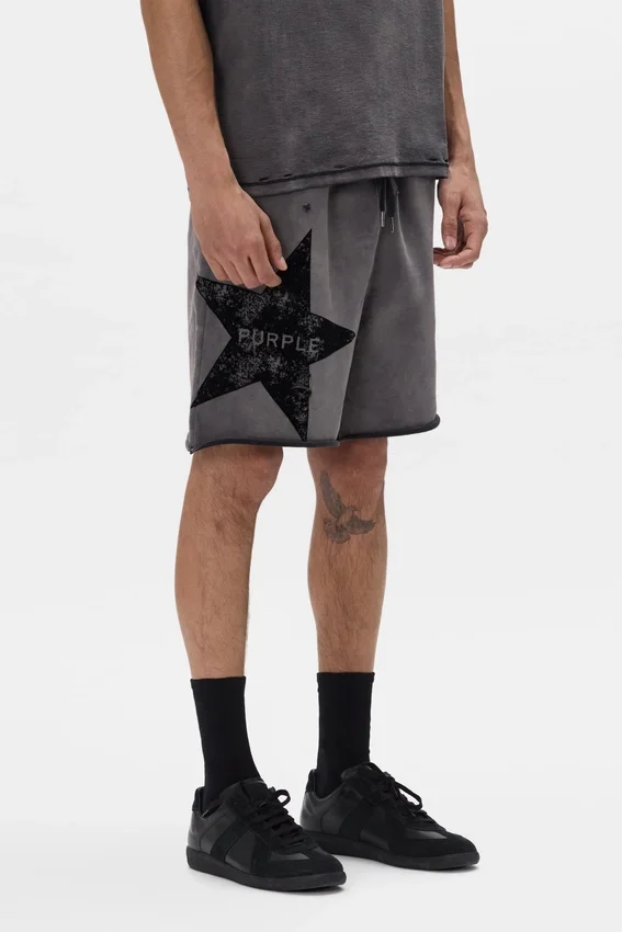 Pantaloncini con scritta a forma di stella
