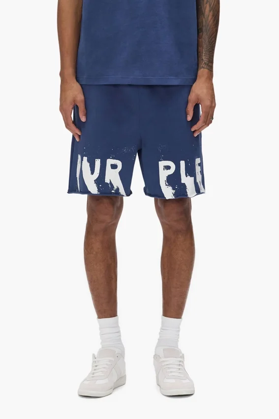 Pantaloncini con scritta dipinta