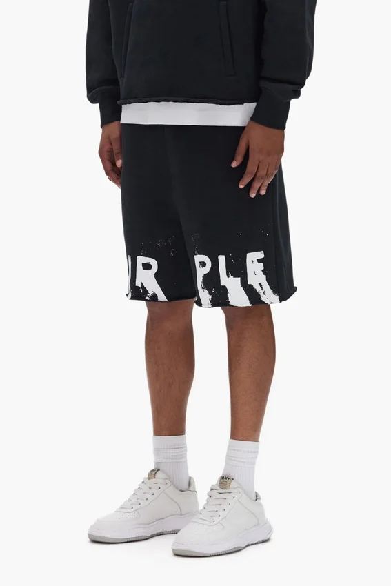 Pantaloncini con scritta dipinta