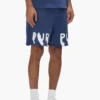 Pantaloncini con scritta dipinta
