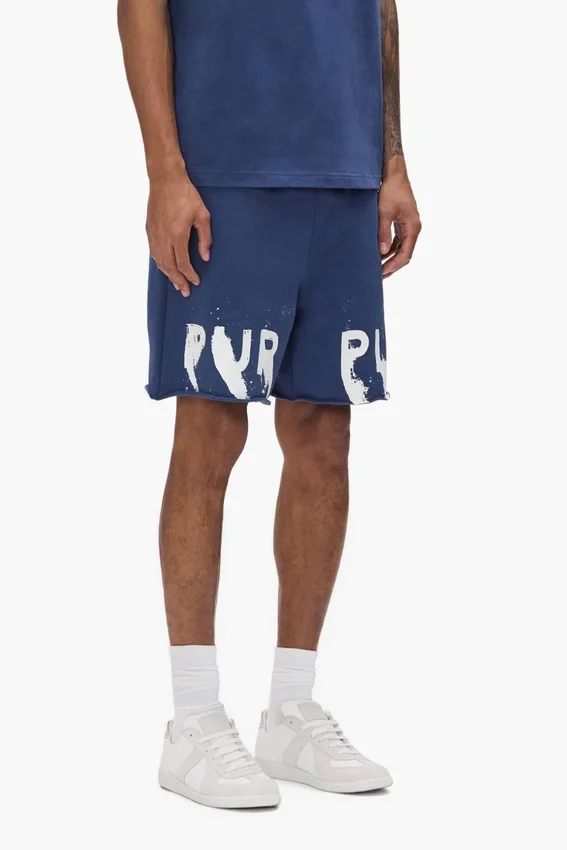 Pantaloncini con scritta dipinta