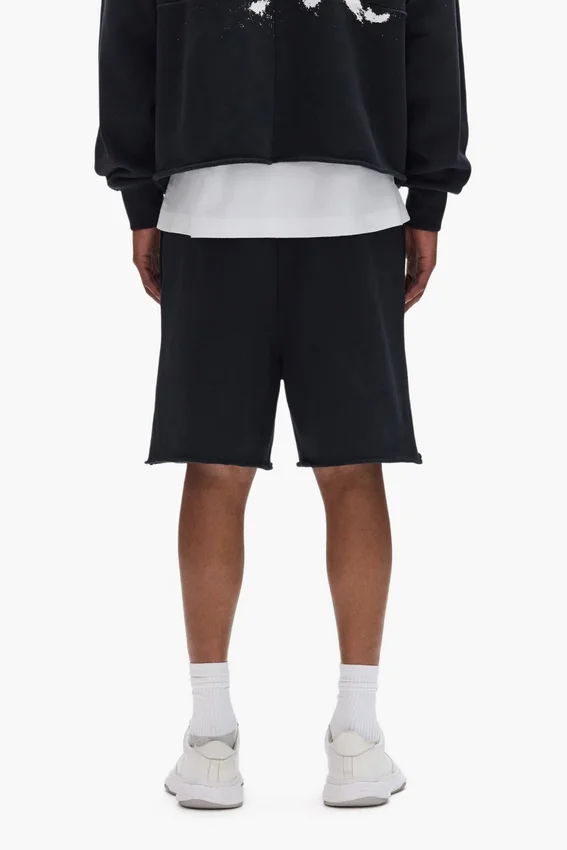 Pantaloncini con scritta dipinta
