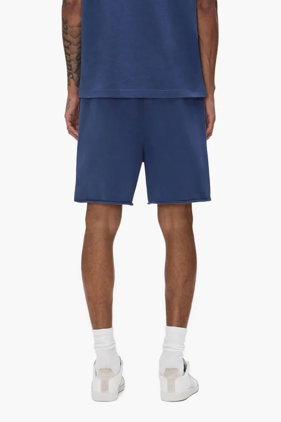 Pantaloncini con scritta dipinta