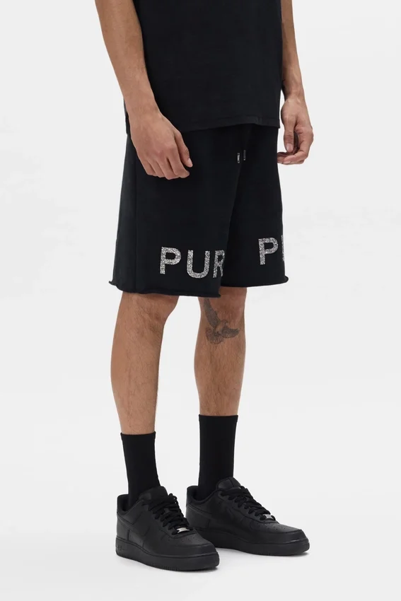 Pantaloncini con scritta in cristalli