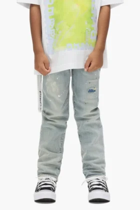 Pantaloni da bambino in indaco chiaro con effetto "paint repair"