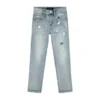 Pantaloni da bambino in indaco chiaro con effetto "paint repair"