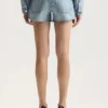 Shorts tagliati con logo bling