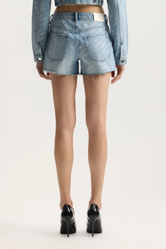Shorts tagliati con logo bling