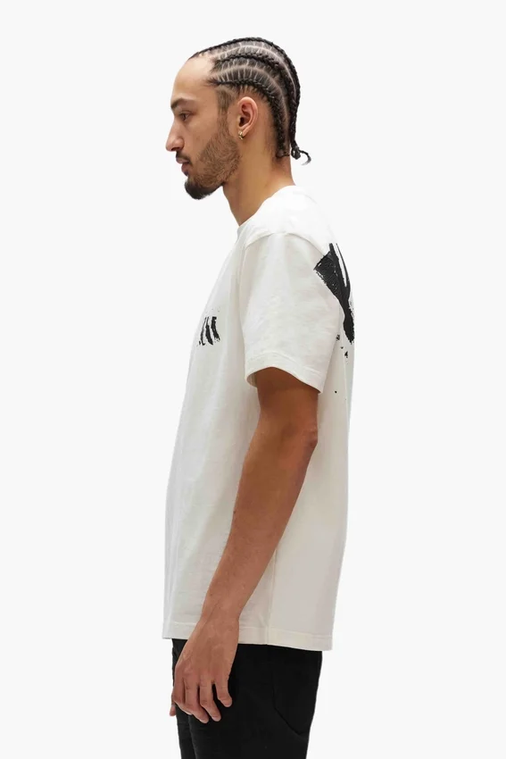 T-shirt con logo dipinto