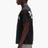 T-shirt con logo dipinto